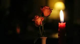 lutto-fiore-candela.jpg